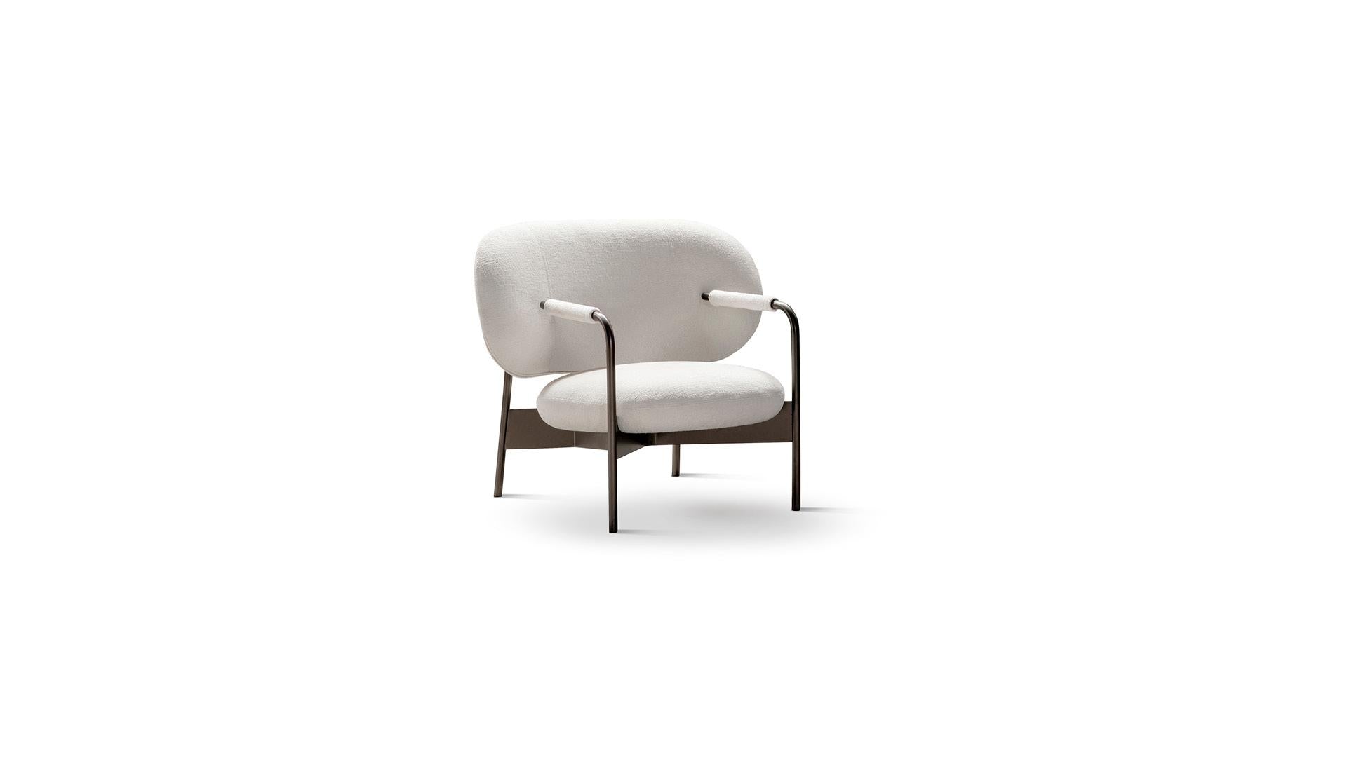 ARMCHAIRS AND POUFS