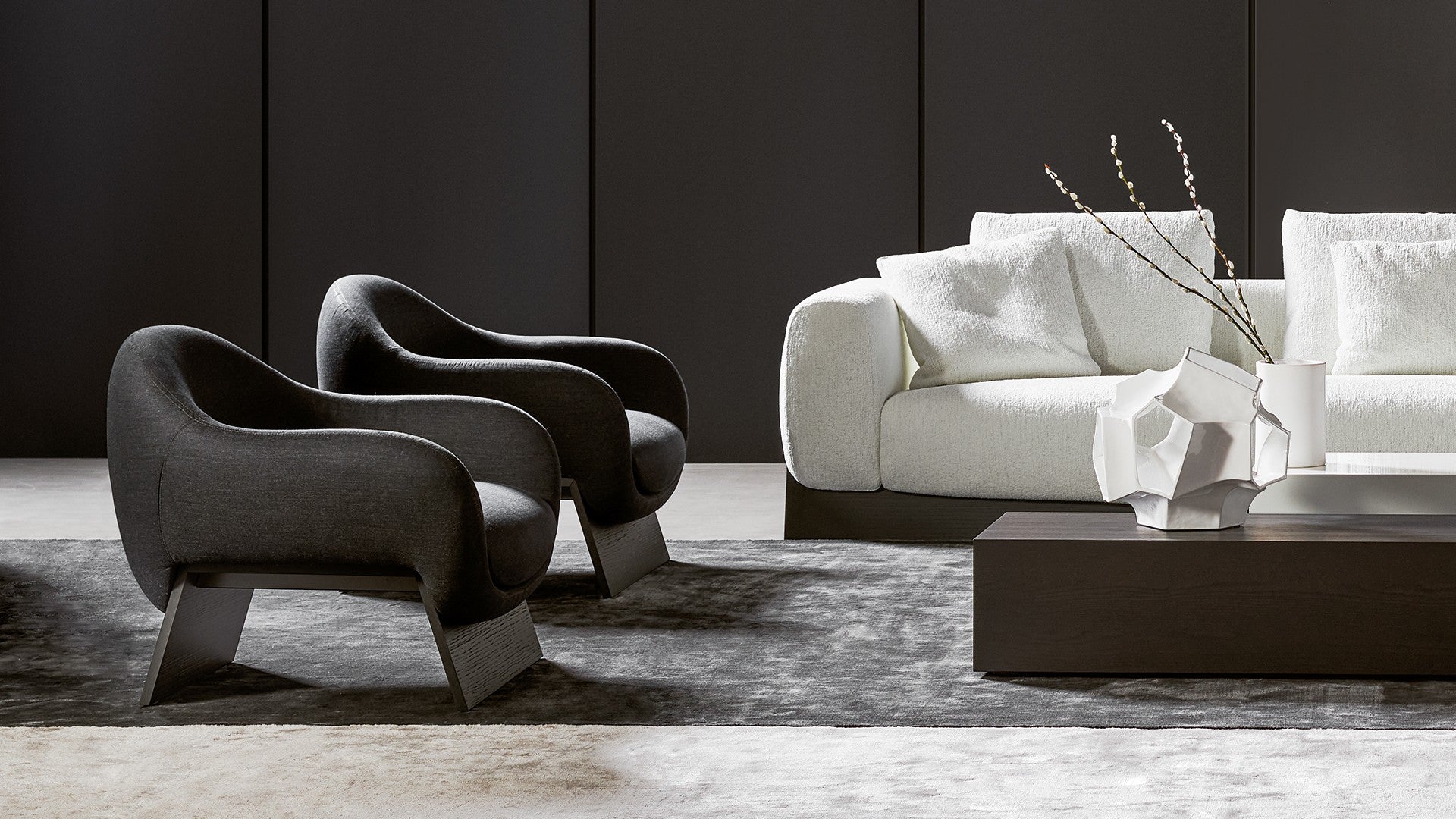 ARMCHAIRS AND POUFS