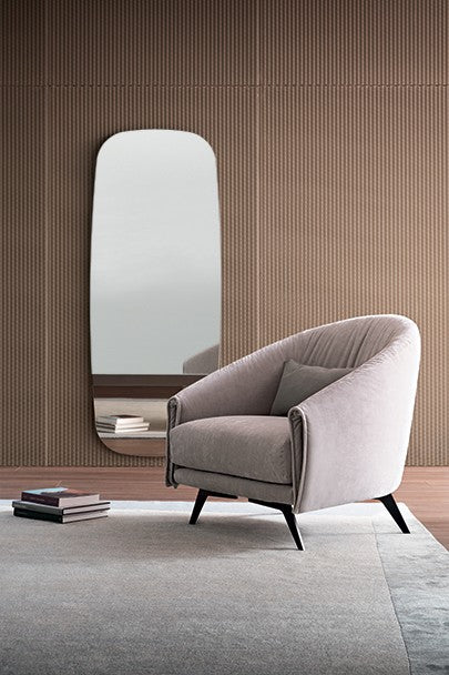 ARMCHAIRS AND POUFS