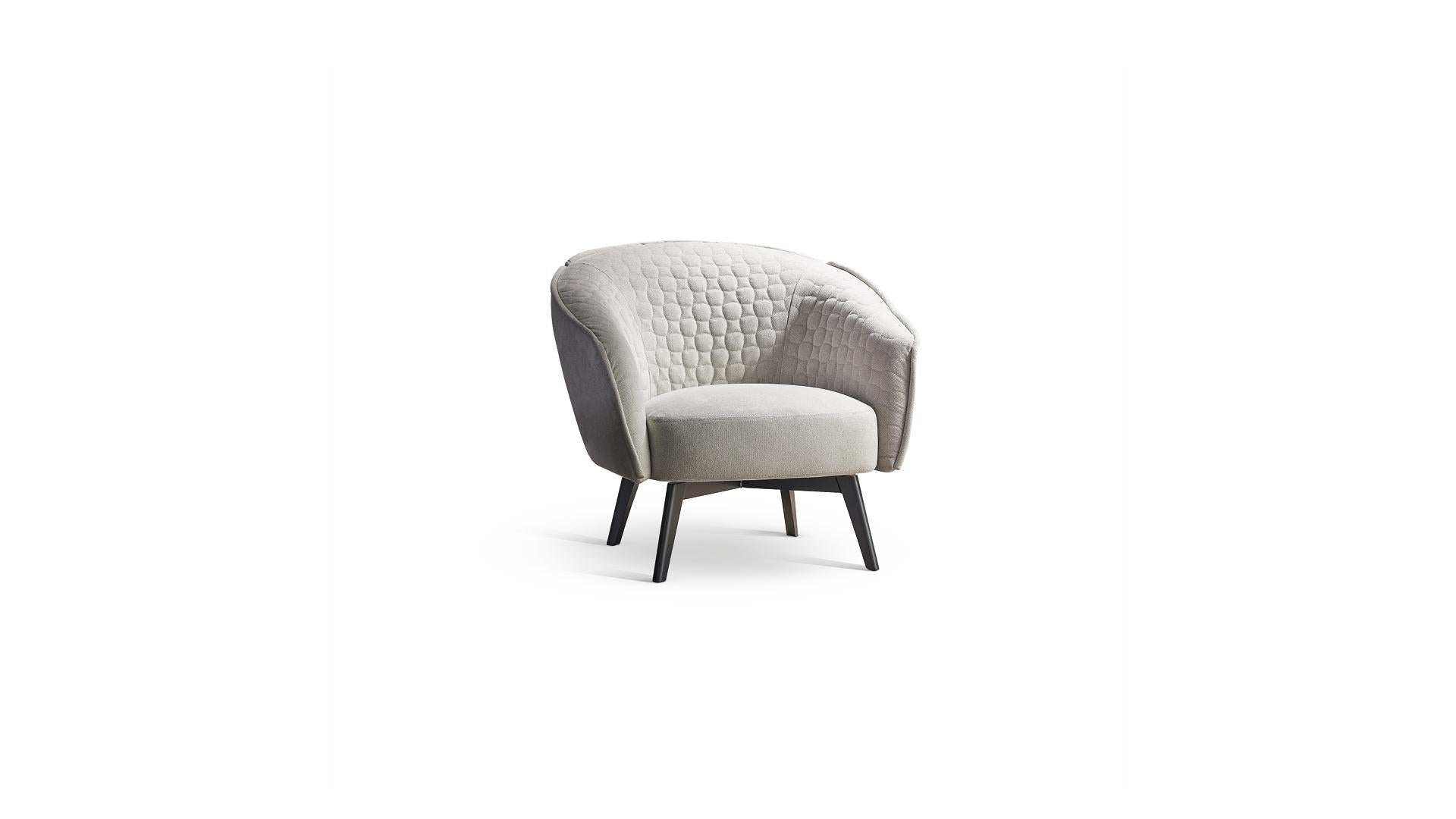 ARMCHAIRS AND POUFS