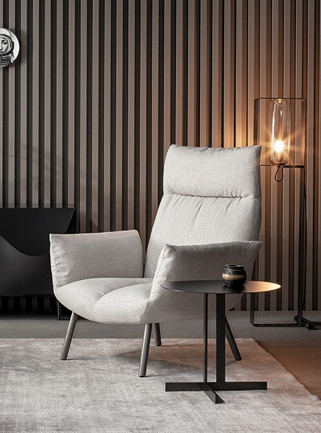 ARMCHAIRS AND POUFS