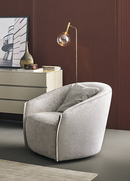 ARMCHAIRS AND POUFS