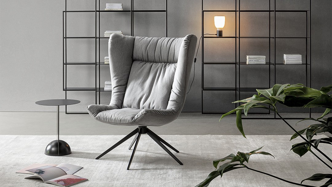 ARMCHAIRS AND POUFS