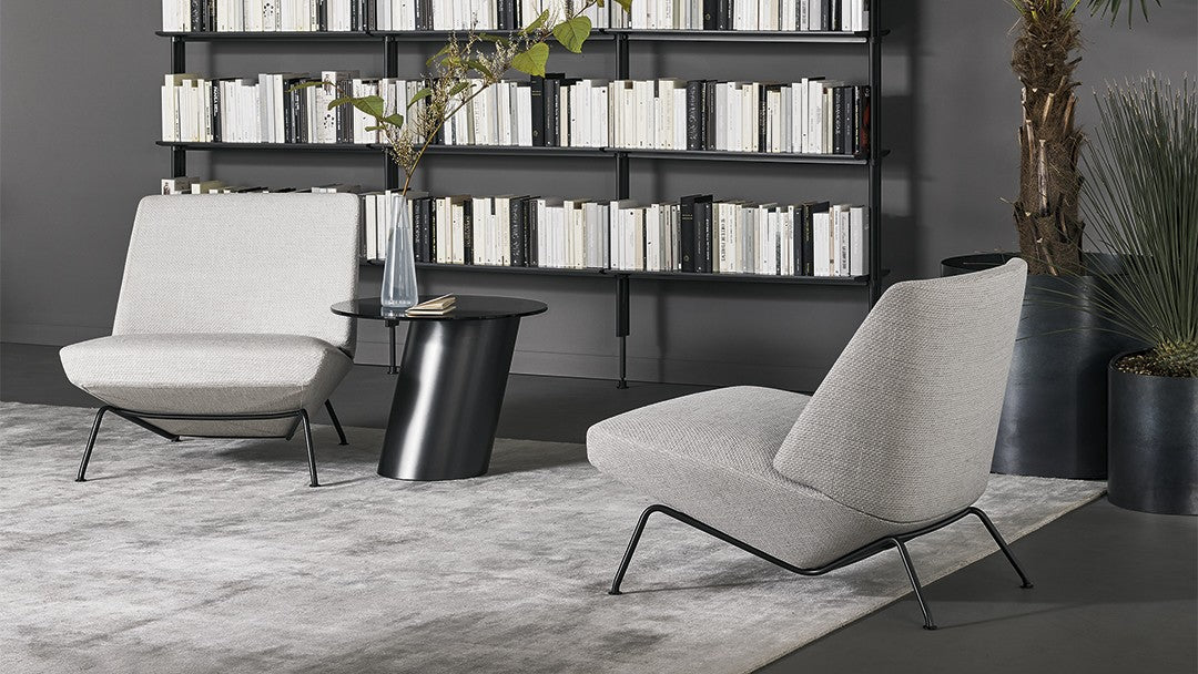 ARMCHAIRS AND POUFS