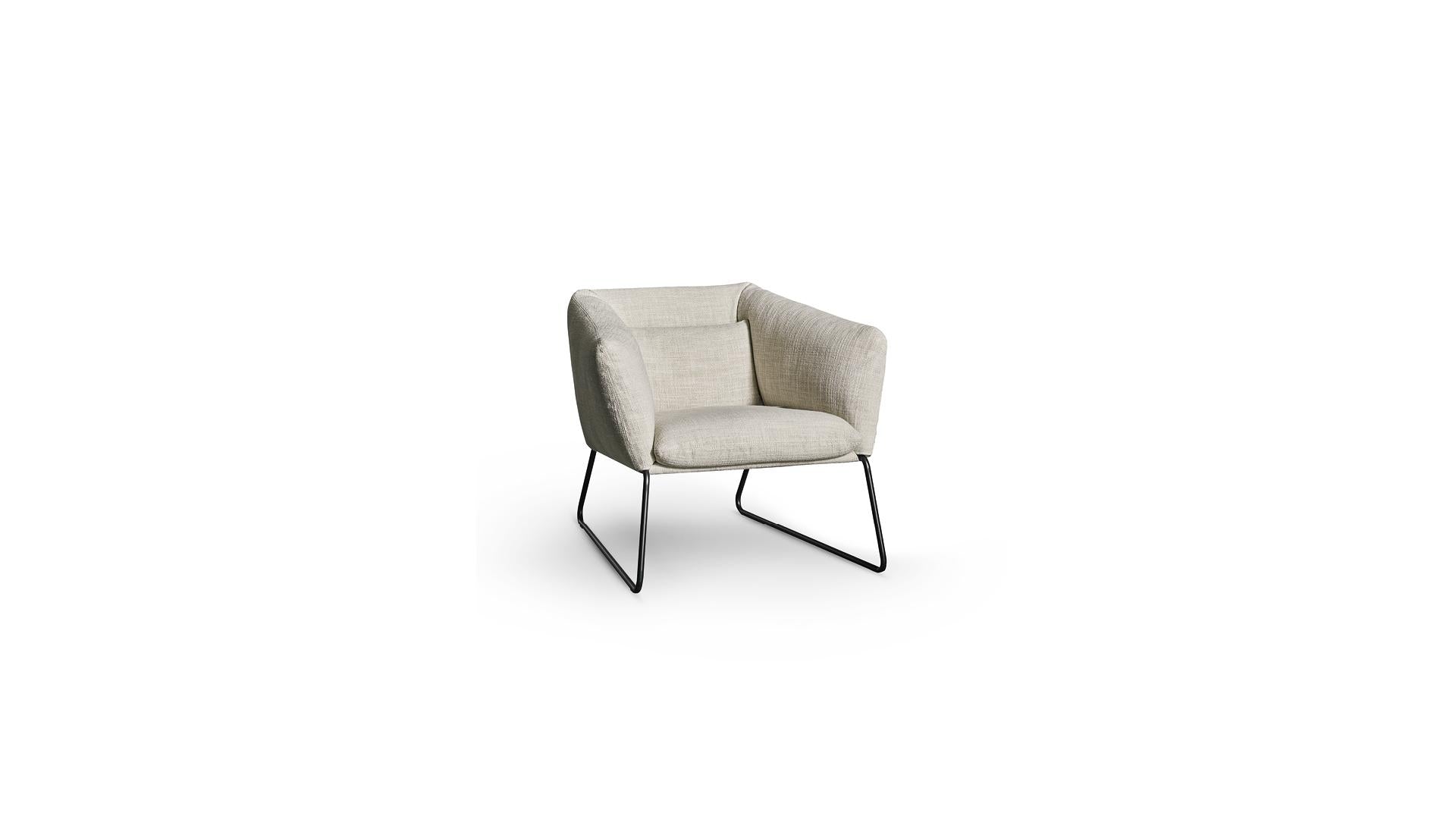 ARMCHAIRS AND POUFS