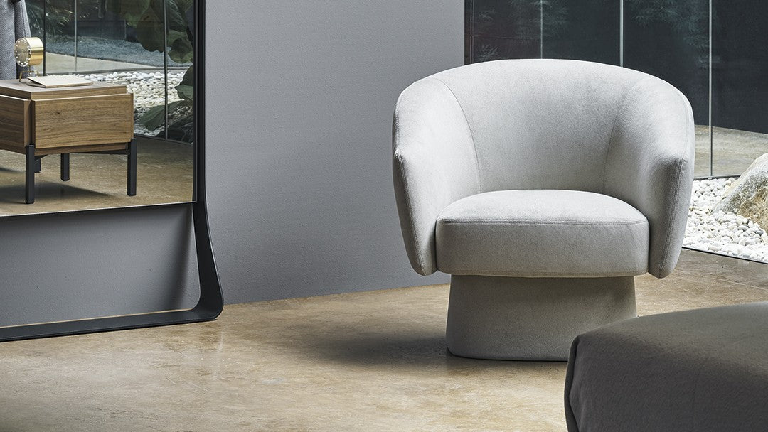 ARMCHAIRS AND POUFS