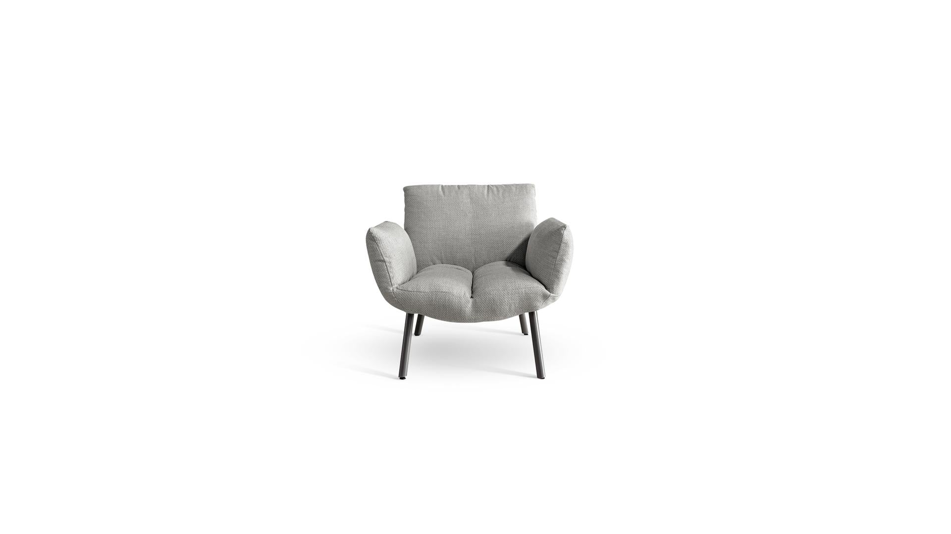 ARMCHAIRS AND POUFS